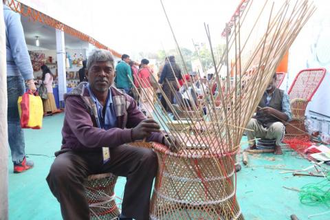 A man making bamboo craft
