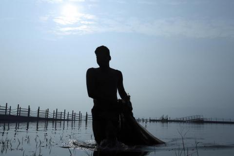 Silhouette of a Fisherman