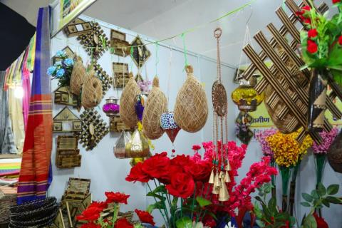 Craft of bird nest with artificial flowers