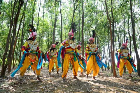 A Group of men performing Jharkhand traditional dance